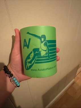 Aviator Nation Neon Green Can Cooler with Teal Surf Graphic